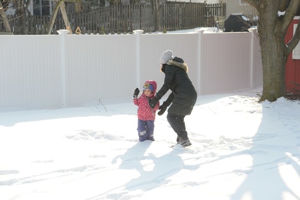 Erynn throwing Greta into the snow3